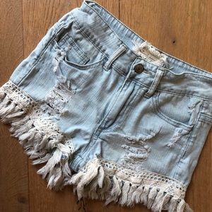 Altar’d State light wash denim shorts.